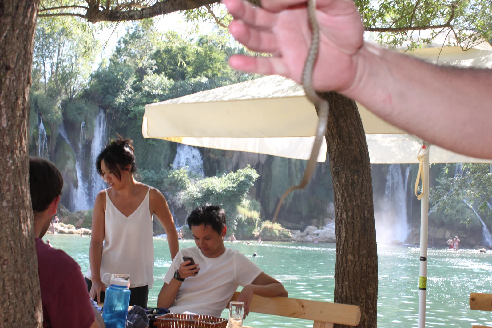Swimmers in the pool at Kravica Waterfall